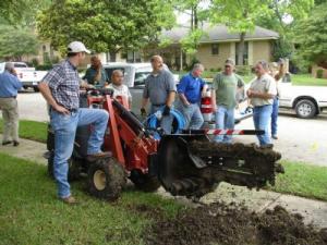 a large trencher at a Pittsburg Irrigation Repair job